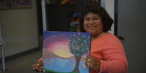 REACH Participant Showing Off Art